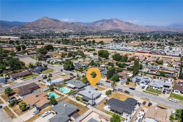 1504 Valaria Dr, Highland, CA 92346 - aerial view of property's location with a mountainous background and nearby suburban area