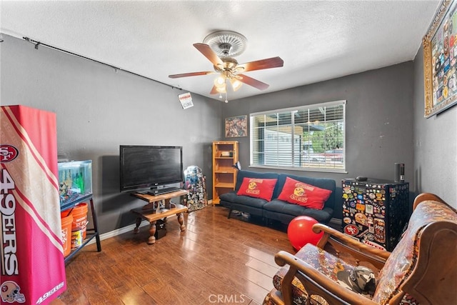 1504 Valaria Dr, Highland, CA 92346 - living room with ceiling fan, wood finished floors, and a textured ceiling