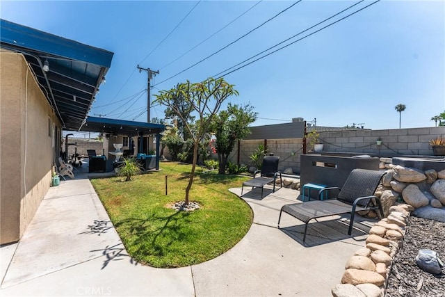 1504 Valaria Dr, Highland, CA 92346 - fenced backyard featuring a patio area