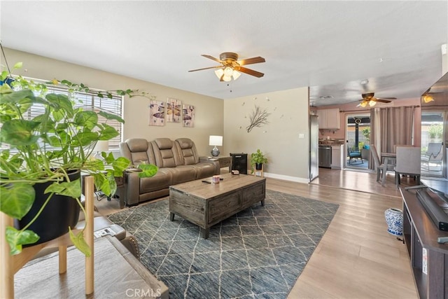 1504 Valaria Dr, Highland, CA 92346 - living area featuring a ceiling fan and wood finished floors