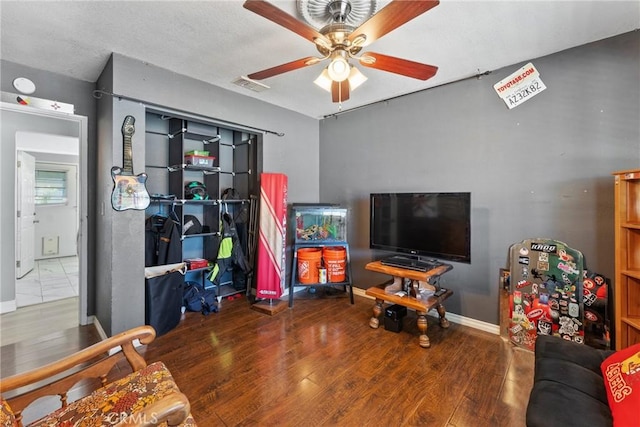 1504 Valaria Dr, Highland, CA 92346 - living room featuring ceiling fan and wood finished floors
