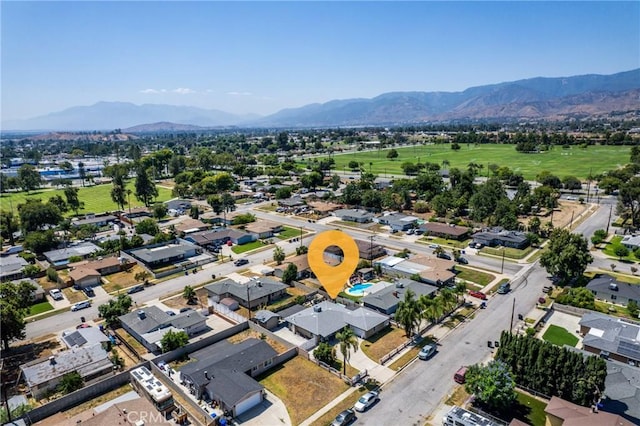 1504 Valaria Dr, Highland, CA 92346 - aerial perspective of suburban area featuring a mountain backdrop
