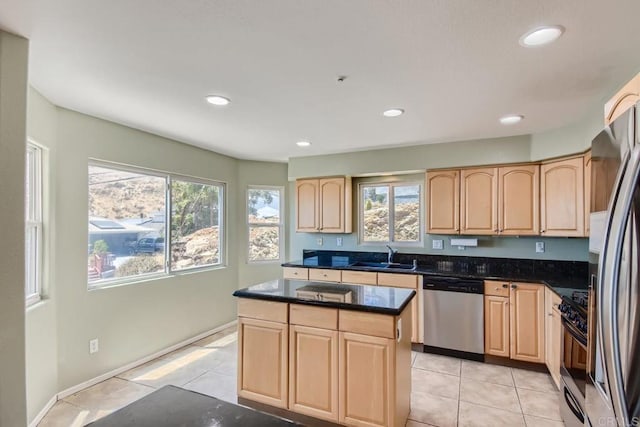 1413 San Miguel Ave, Spring Valley, CA 91977 - kitchen featuring stainless steel appliances, light brown cabinets, light tile patterned flooring, recessed lighting, and a center island