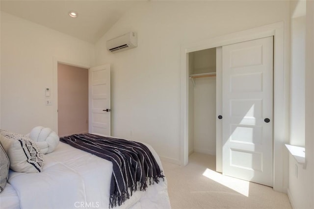 5351 Filbert St, Paradise, CA 95969 - bedroom with a wall unit AC, light carpet, a closet, and vaulted ceiling