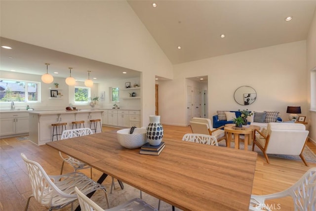 5351 Filbert St, Paradise, CA 95969 - dining area featuring light wood-type flooring, recessed lighting, and high vaulted ceiling