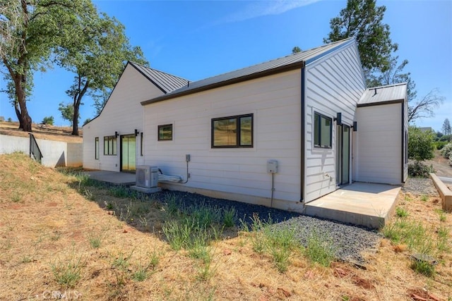 5351 Filbert St, Paradise, CA 95969 - rear view of house featuring a metal roof and a standing seam roof