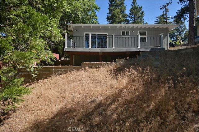 30607 Live Oak Dr, Running Springs, CA 92382 - back of property featuring a wooden deck