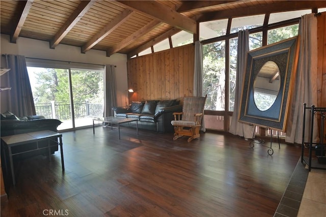 30607 Live Oak Dr, Running Springs, CA 92382 - living area with wood finished floors, high vaulted ceiling, wooden walls, and a wood ceiling with exposed beams