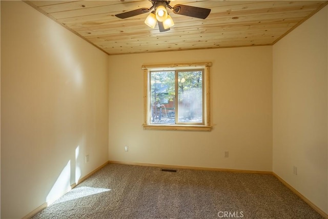 418 Los Angeles Ave, Sugarloaf, CA 92386 - carpeted spare room with wooden ceiling, a ceiling fan, and crown molding