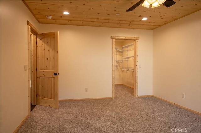 418 Los Angeles Ave, Sugarloaf, CA 92386 - unfurnished bedroom featuring recessed lighting, carpet, wooden ceiling, and a walk in closet