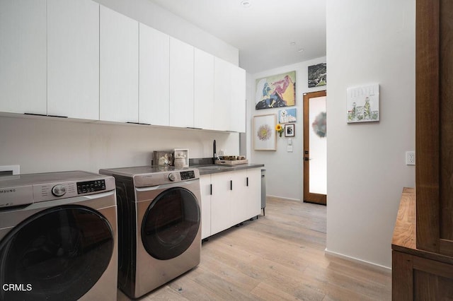 850 Sienna Way, Santa Ynez, CA 93460 - laundry room featuring cabinet space, washer and clothes dryer, and light wood-style floors