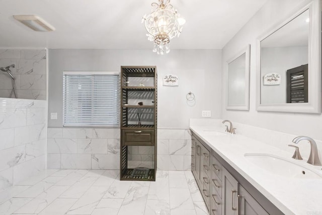139 Parnassus Cir, Oceanside, CA 92054 - bathroom with marble finish floors, double vanity, a walk in shower, a chandelier, and tile walls