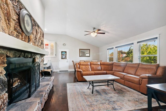 139 Parnassus Cir, Oceanside, CA 92054 - living room featuring lofted ceiling, a ceiling fan, dark wood-style flooring, and a stone fireplace