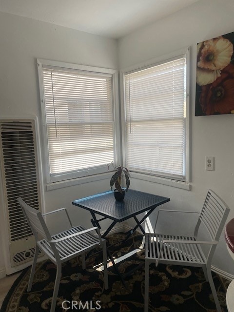 381 W Wabash St, San Bernardino, CA 92405 - dining room with a heating unit and baseboards