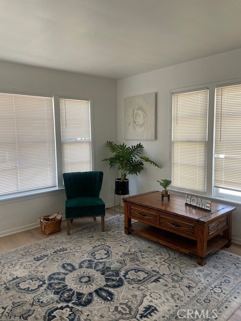 381 W Wabash St, San Bernardino, CA 92405 - sitting room with wood finished floors and baseboards