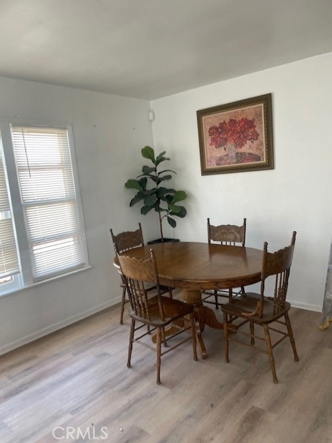 381 W Wabash St, San Bernardino, CA 92405 - dining area featuring light wood finished floors and baseboards