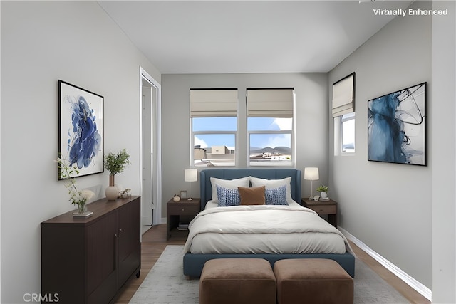 27422 Pioneer Ct, Valencia, CA 91381 - bedroom with light wood-style flooring and baseboards