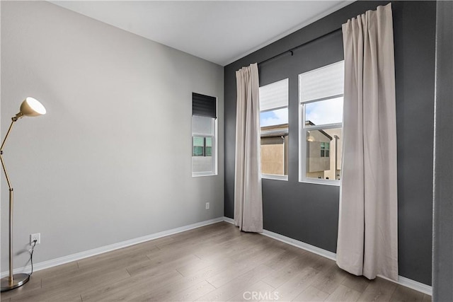 27422 Pioneer Ct, Valencia, CA 91381 - empty room with wood finished floors and baseboards