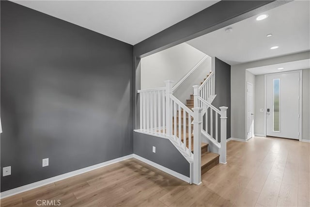 27422 Pioneer Ct, Valencia, CA 91381 - foyer entrance with wood finished floors, stairway, and recessed lighting