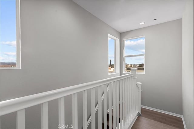 27422 Pioneer Ct, Valencia, CA 91381 - hall featuring wood finished floors, plenty of natural light, and an upstairs landing