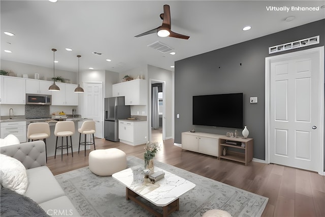 27422 Pioneer Ct, Valencia, CA 91381 - living area featuring a ceiling fan, light wood finished floors, and recessed lighting
