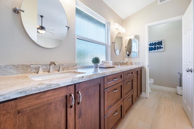 1592 Hawk View Dr, Encinitas, CA 92024 - bathroom with ceiling fan and double vanity