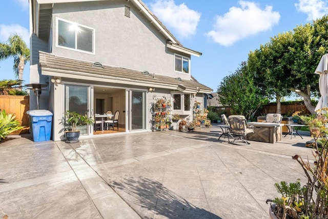 1592 Hawk View Dr, Encinitas, CA 92024 - back of property with a patio and stucco siding