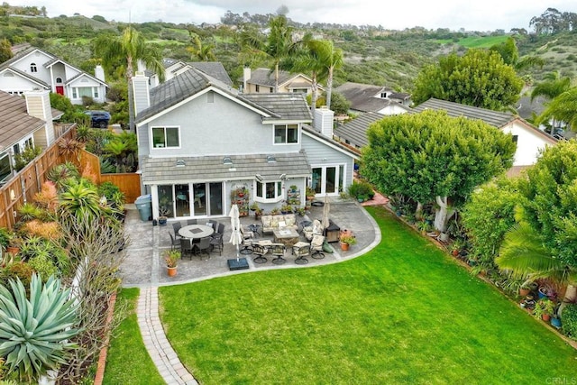 1592 Hawk View Dr, Encinitas, CA 92024 - back of house with a patio, stucco siding, and a chimney