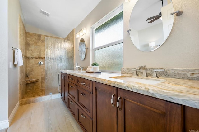 1592 Hawk View Dr, Encinitas, CA 92024 - bathroom with lofted ceiling, double vanity, a ceiling fan, walk in shower, and tile patterned floors