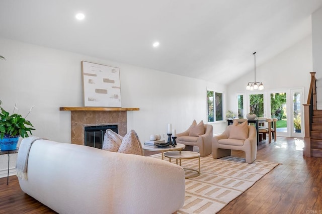 1592 Hawk View Dr, Encinitas, CA 92024 - living room with a fireplace, wood finished floors, high vaulted ceiling, and recessed lighting