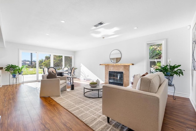 1592 Hawk View Dr, Encinitas, CA 92024 - living area with a tile fireplace, wood finished floors, and recessed lighting