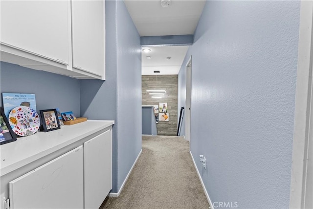1142 Juniper Ct, San Jacinto, CA 92582 - hallway with carpet and baseboards