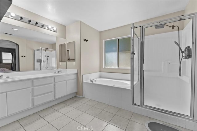 1142 Juniper Ct, San Jacinto, CA 92582 - bathroom featuring a shower stall, a garden tub, tile patterned flooring, and double vanity
