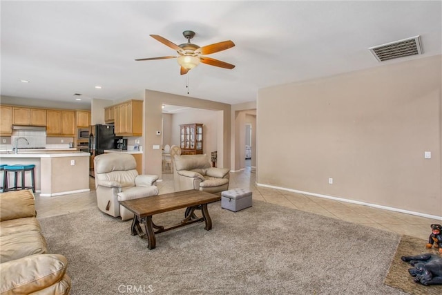 83315 Stagecoach Rd, Indio, CA 92203 - living room featuring light tile patterned floors, ceiling fan, and recessed lighting