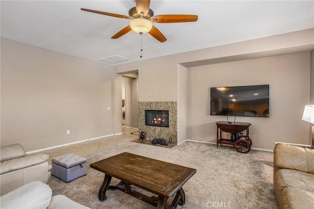 83315 Stagecoach Rd, Indio, CA 92203 - carpeted living area with ceiling fan and a fireplace with flush hearth