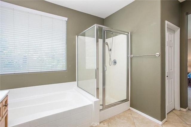 83315 Stagecoach Rd, Indio, CA 92203 - full bath featuring a shower stall, a bath, tile patterned flooring, and vanity