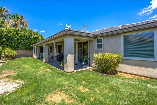 83315 Stagecoach Rd, Indio, CA 92203 - back of house featuring stucco siding and a patio