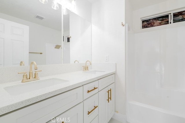16233 Manzanita St, Hesperia, CA 92345 - full bath featuring double vanity and shower / bath combination