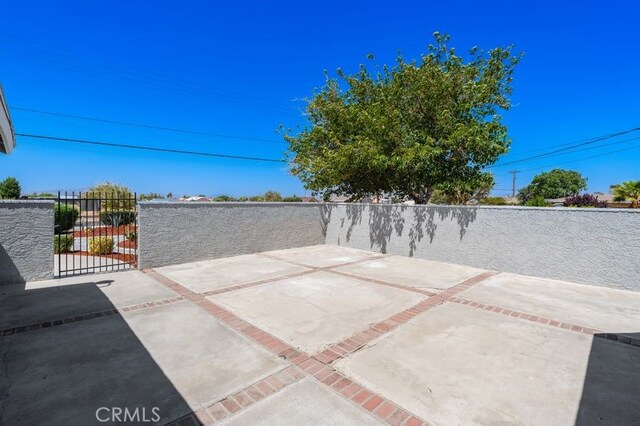 16233 Manzanita St, Hesperia, CA 92345 - view of patio featuring a gate
