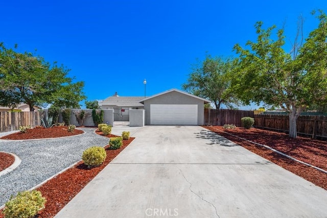 16233 Manzanita St, Hesperia, CA 92345 - single story home featuring a fenced front yard, a garage, driveway, and stucco siding