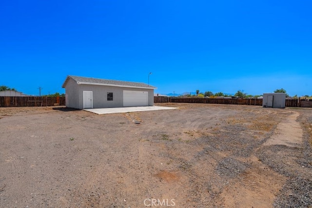 16233 Manzanita St, Hesperia, CA 92345 - fenced backyard featuring an outdoor structure