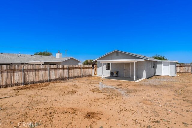 16233 Manzanita St, Hesperia, CA 92345 - rear view of house featuring a fenced backyard and a patio