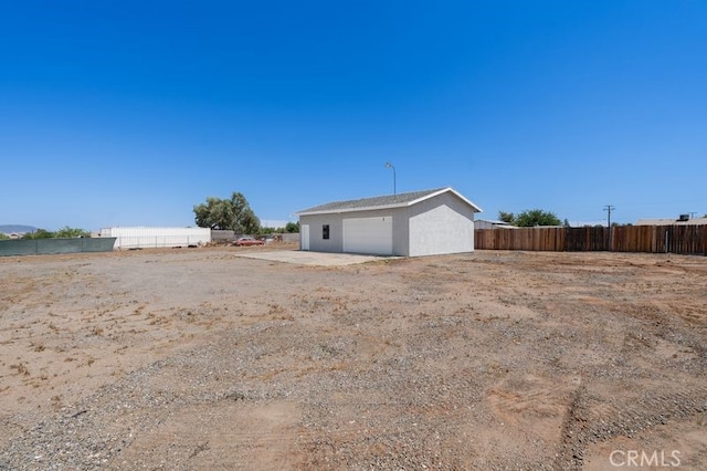 16233 Manzanita St, Hesperia, CA 92345 - view of yard featuring an outbuilding and a garage