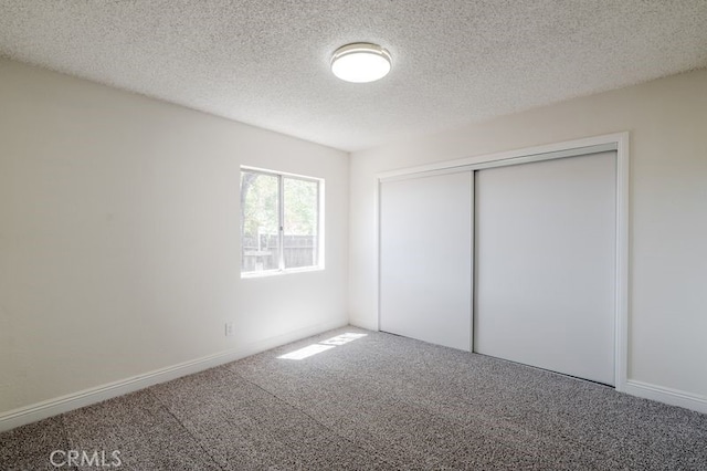16233 Manzanita St, Hesperia, CA 92345 - unfurnished bedroom featuring carpet, a closet, and a textured ceiling