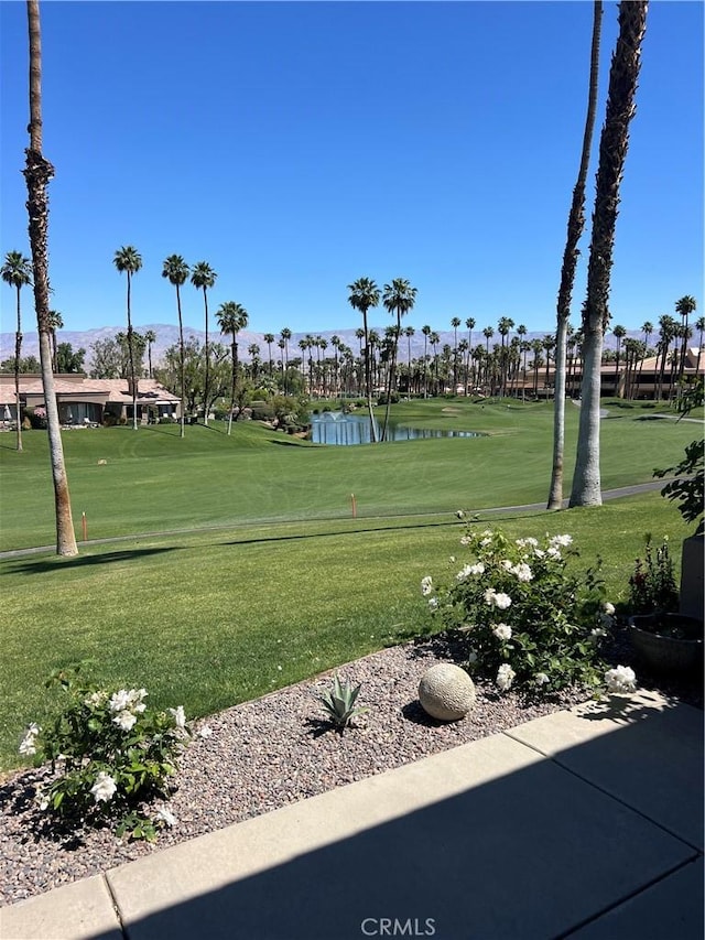 76376 Sweet Pea Way, Palm Desert, CA 92211 - view of community with golf course view, a lawn, and a water and mountain view