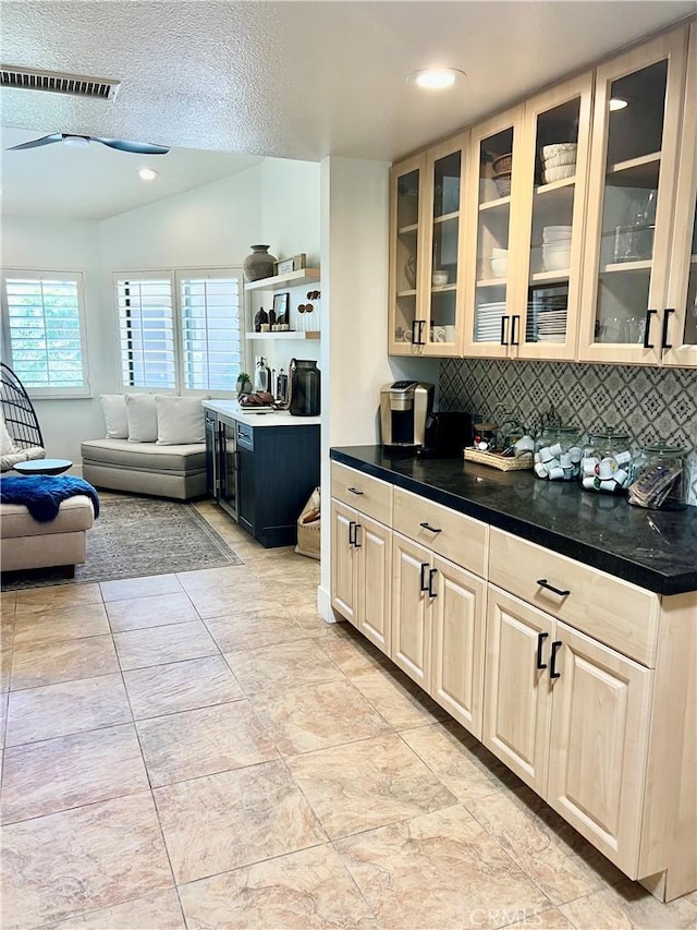76376 Sweet Pea Way, Palm Desert, CA 92211 - kitchen with open floor plan, backsplash, glass insert cabinets, dark countertops, and recessed lighting