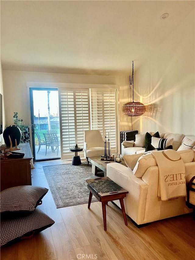 76376 Sweet Pea Way, Palm Desert, CA 92211 - living area featuring light wood finished floors
