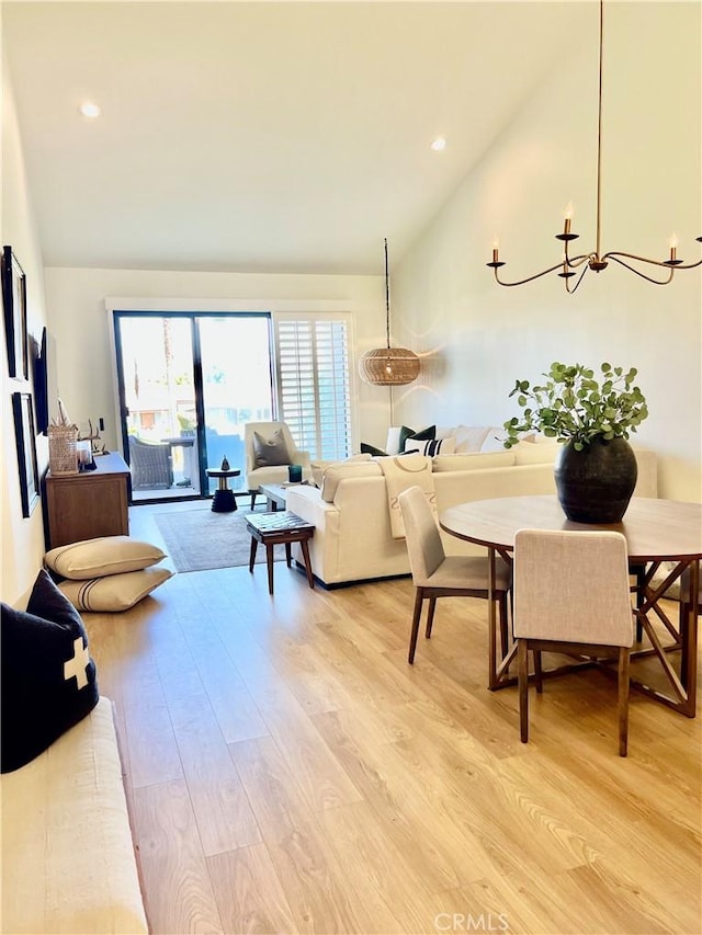 76376 Sweet Pea Way, Palm Desert, CA 92211 - living area featuring vaulted ceiling, a chandelier, light wood finished floors, and recessed lighting