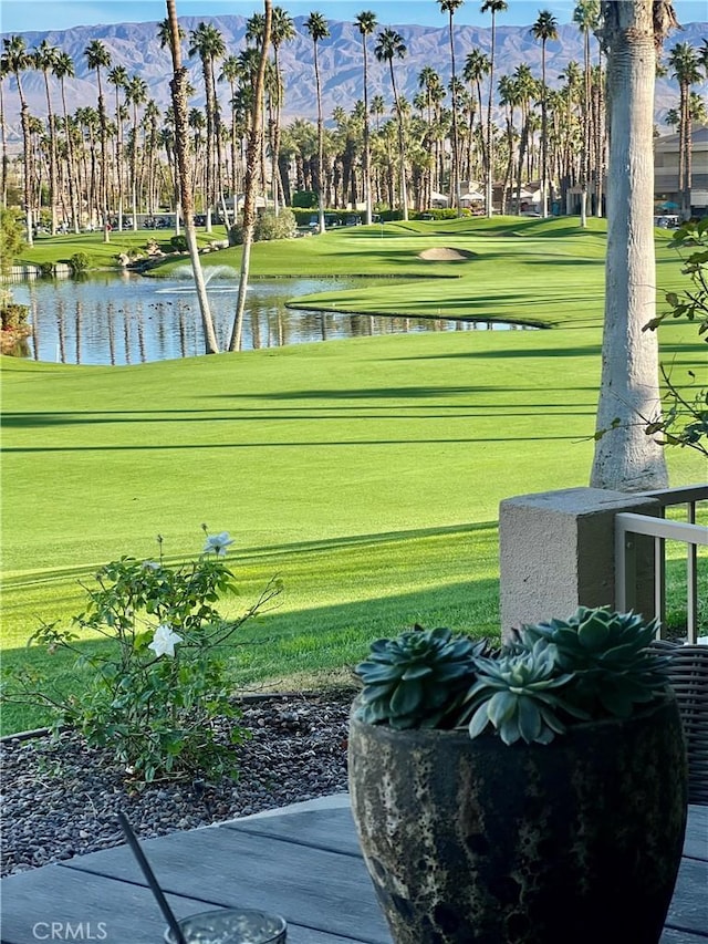 76376 Sweet Pea Way, Palm Desert, CA 92211 - view of community with view of golf course, a water and mountain view, and a lawn