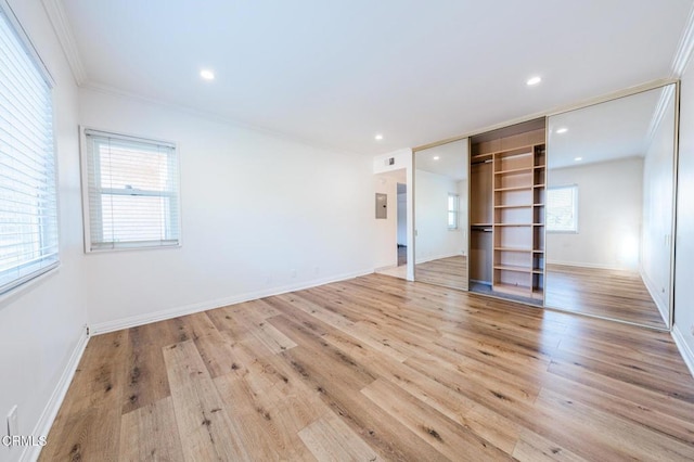 2940 N Verdugo Rd Unit 411, Glendale, CA 91208 - unfurnished bedroom featuring ornamental molding, light wood-style flooring, and recessed lighting